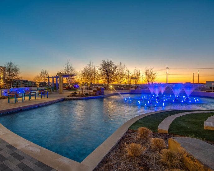 The Realm at Castle Hills fountain with blue LED lights