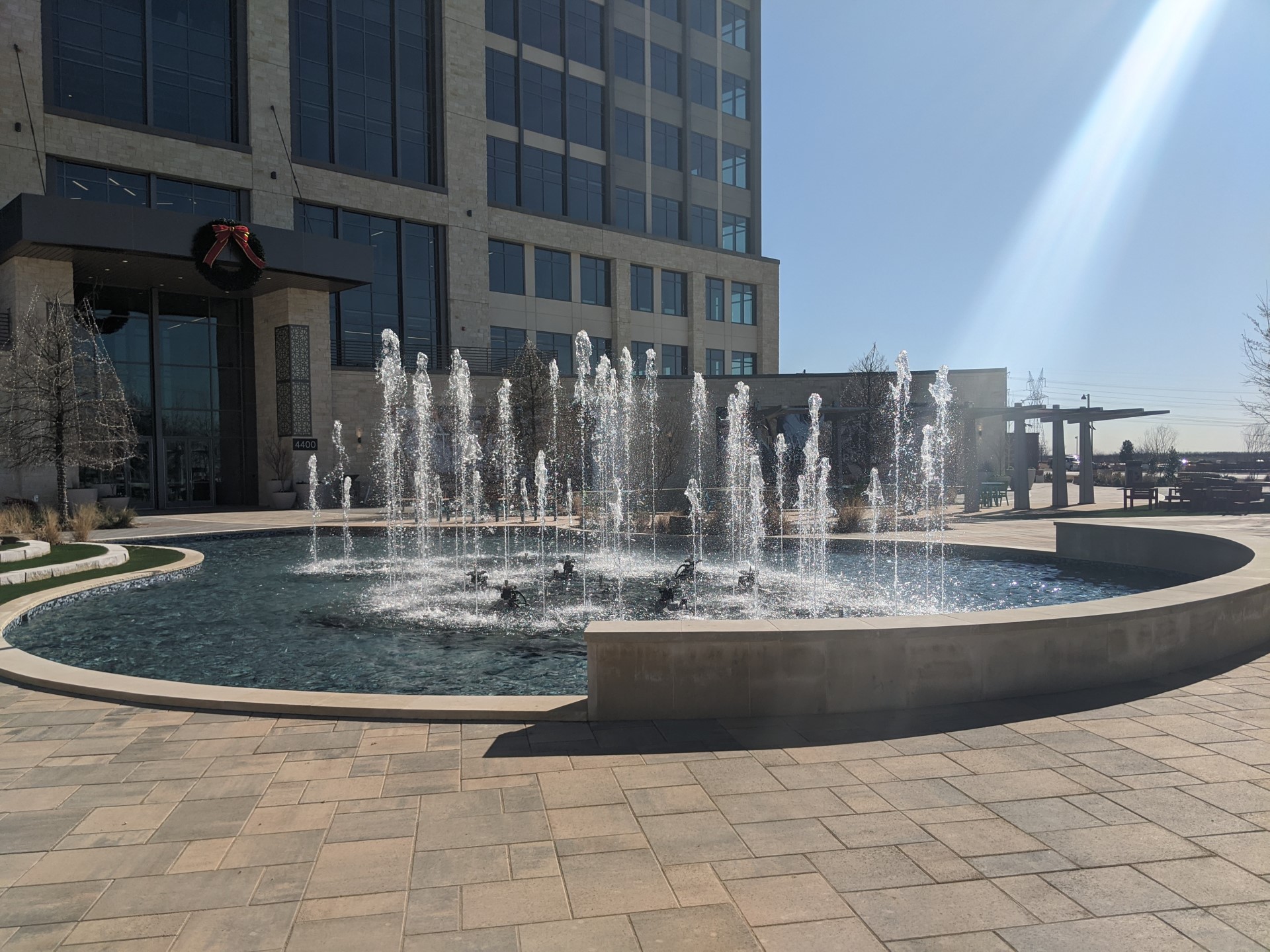 The Realm at Castle Hills choreographed show fountain in the daylight