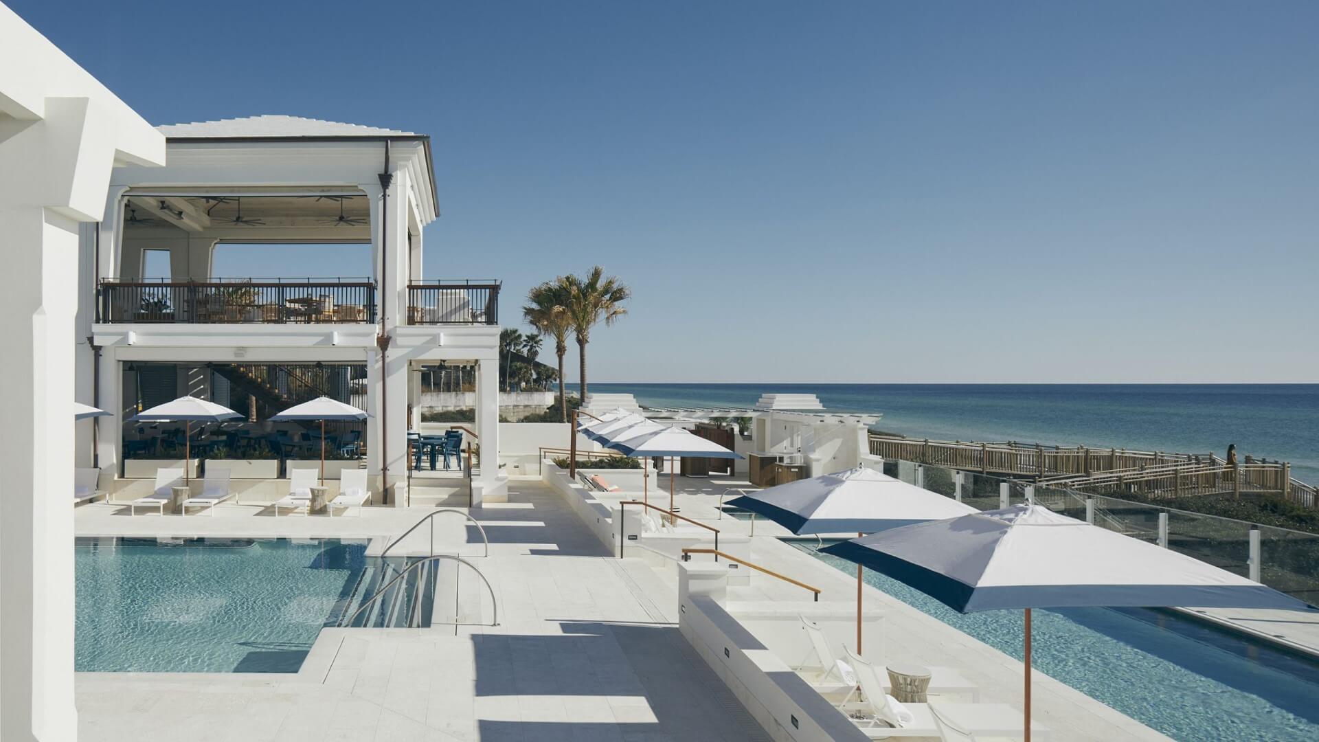 Alys Beach pool spans two levels with hot tubs below.