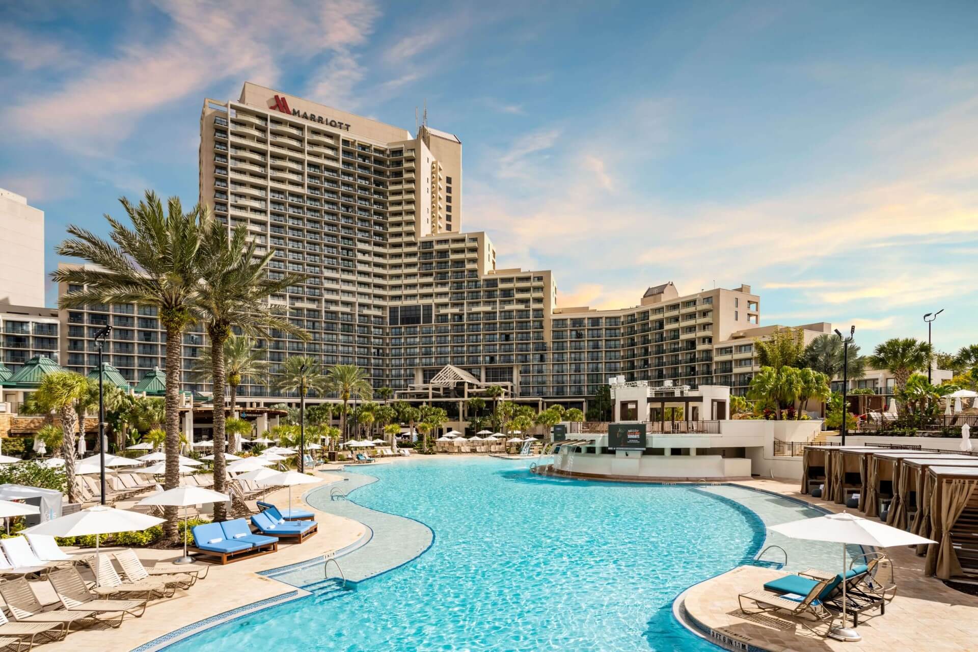 Orlando World Center Marriott Falls Oasis Poolside view of hotel during daytime