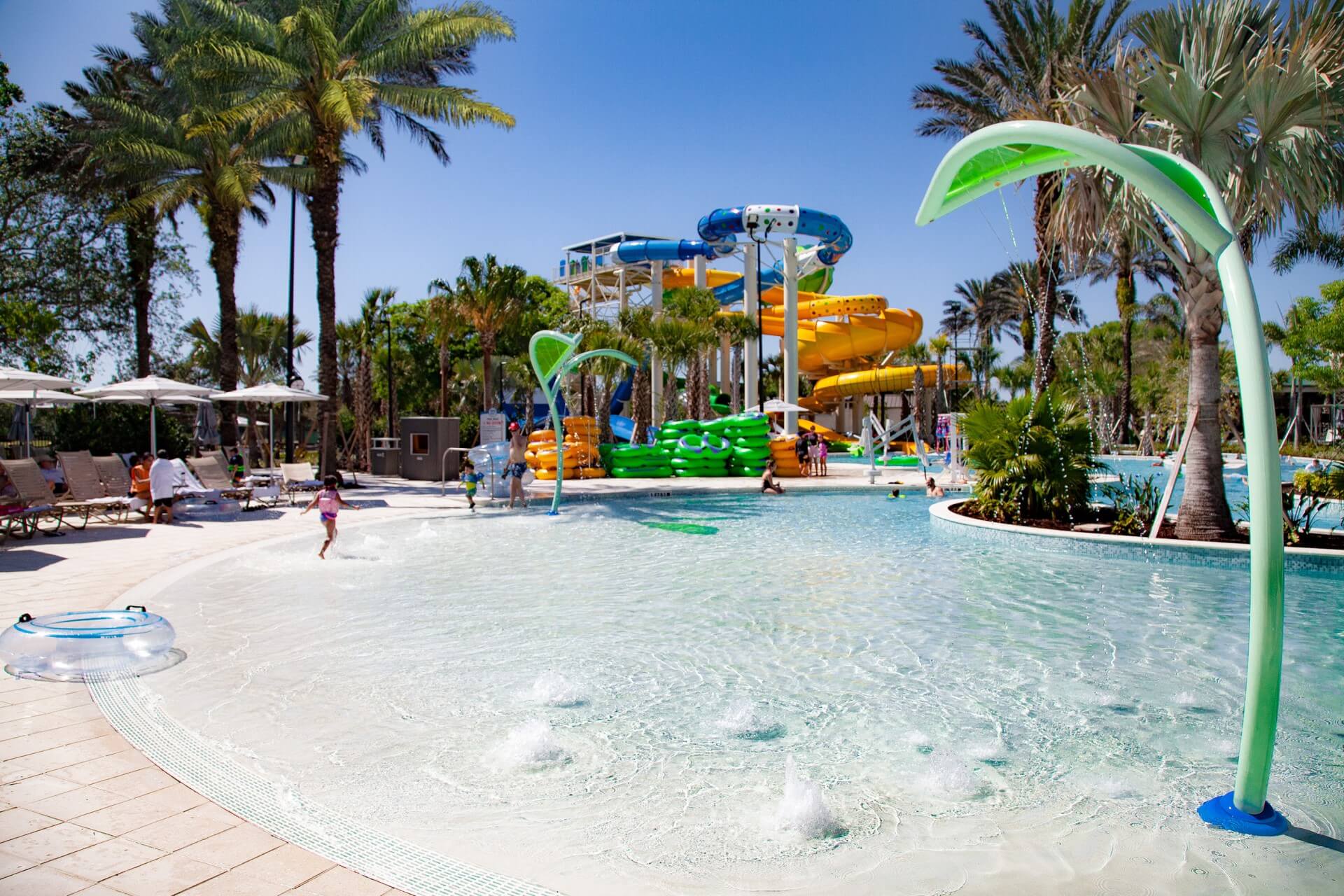 River Falls Waterpark at Orlando World Center Marriott's zero-entry pool with bubbling nozzles and spraying vertical leaf elements