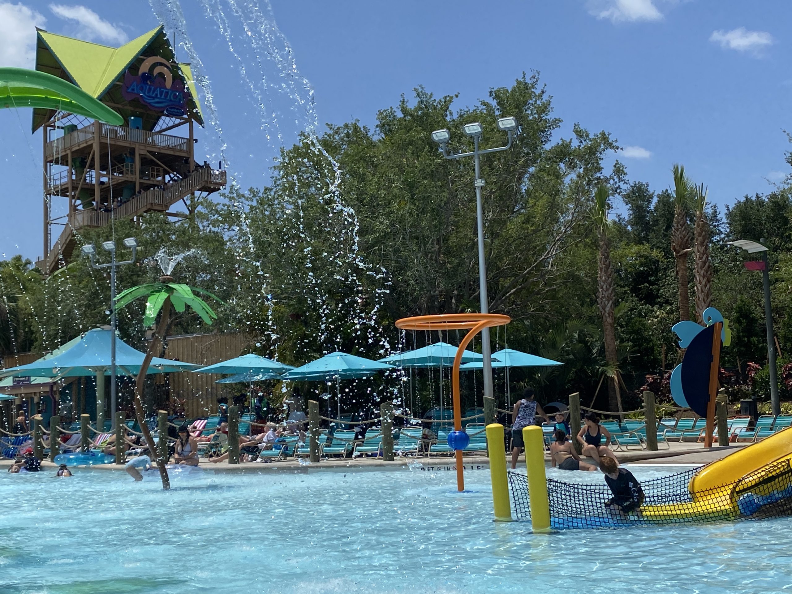Slide tower and interactive water features at Aquatica Turi's Kids Cove
