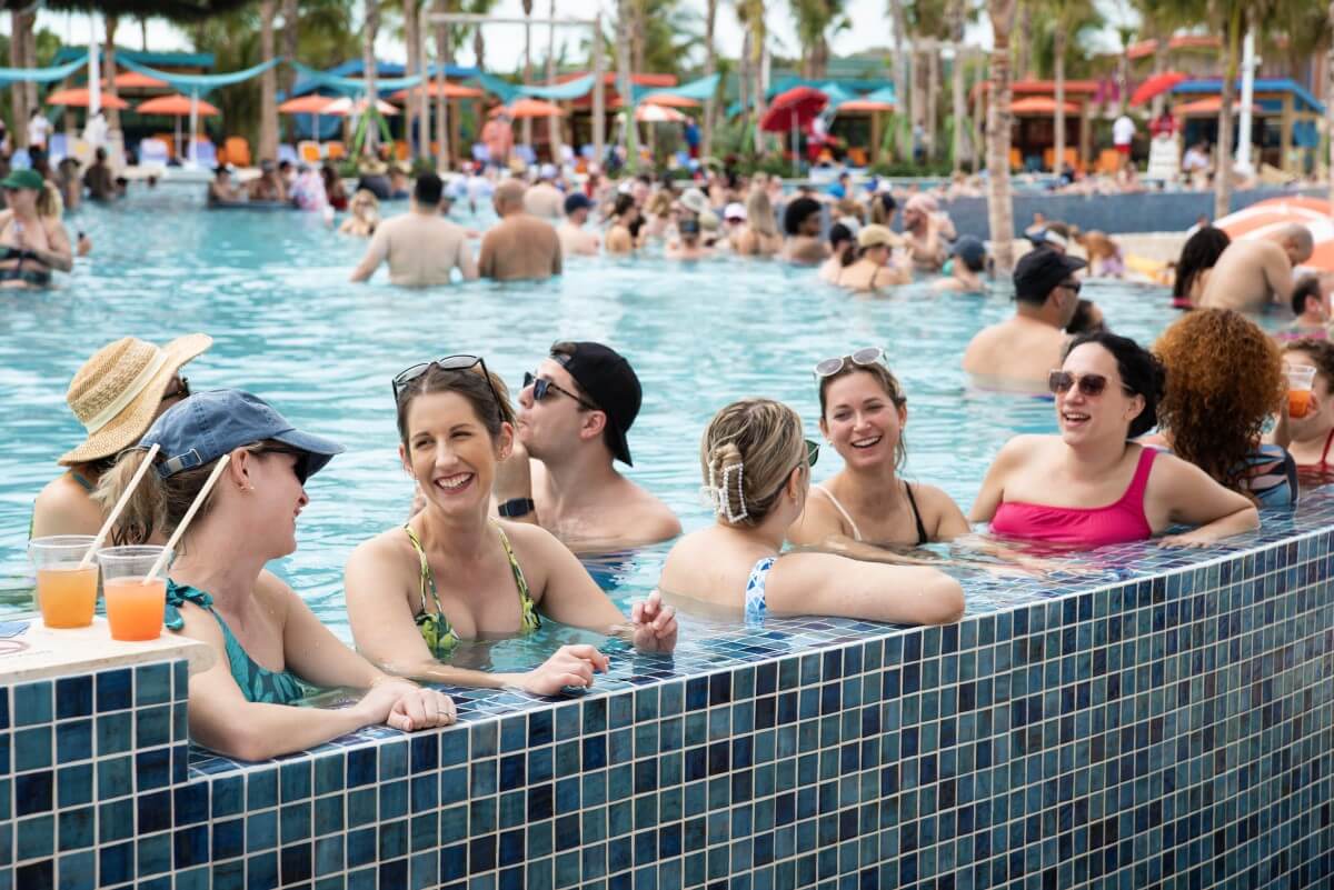Team enjoying Hideaway Beach pool during cruise to CocoCay
